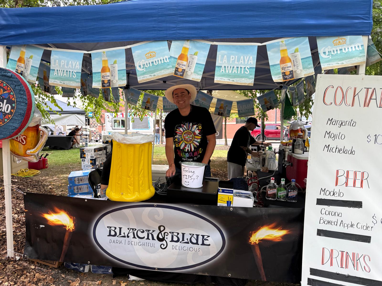 Black and Blue beverage booth at the festival