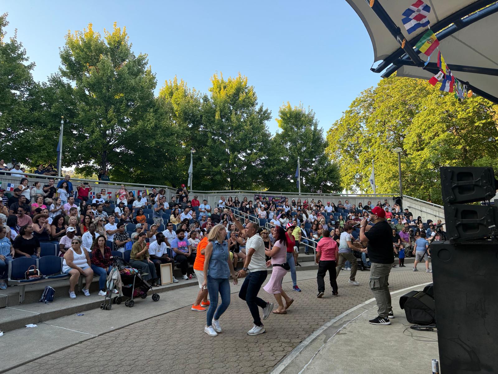 Festival crowd dancing at Riverside Park